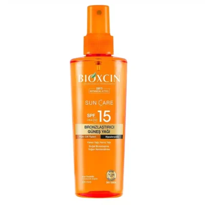 روغن ضد آفتاب و برنزه کننده بیوکسین BIOXCIN SPF15 | محافظت از پوست در برابر اشعه UV، کمک به ایجاد رنگ برنزه طبیعی و یکنواخت، حاوی روغن‌های مغذی برای شادابی پوست | 200 میل